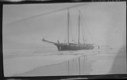 Image of Vessel moored (GODTHAAB?). Men on ice floe nearby